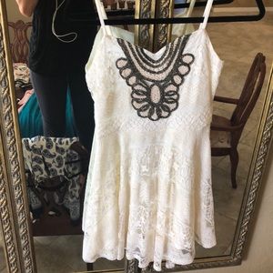 Dillard’s dress flowy at the bottom!